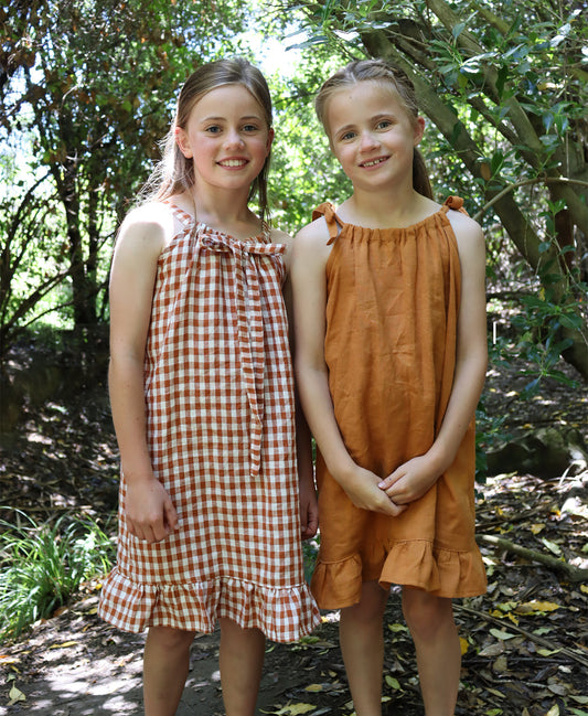 Below the Kōwhai Baby/Child Kororā Dress PDF